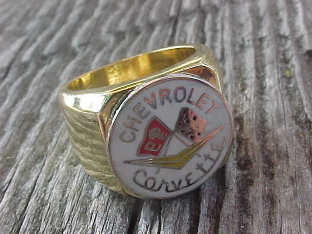 1960s CHEVROLET CORVETTE FLAGS GOLD CHROME RING #8 NOS HI- QUALITY CLASS UNIQUE