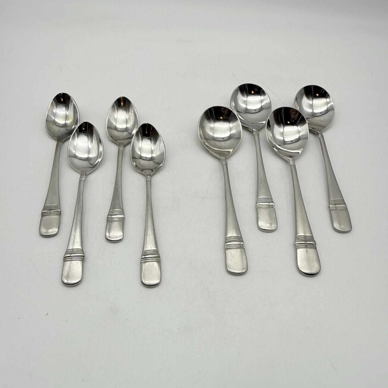 Heirloom by Oneida 18/10 ... 4 Soup Spoons And 4 Small Spoons
