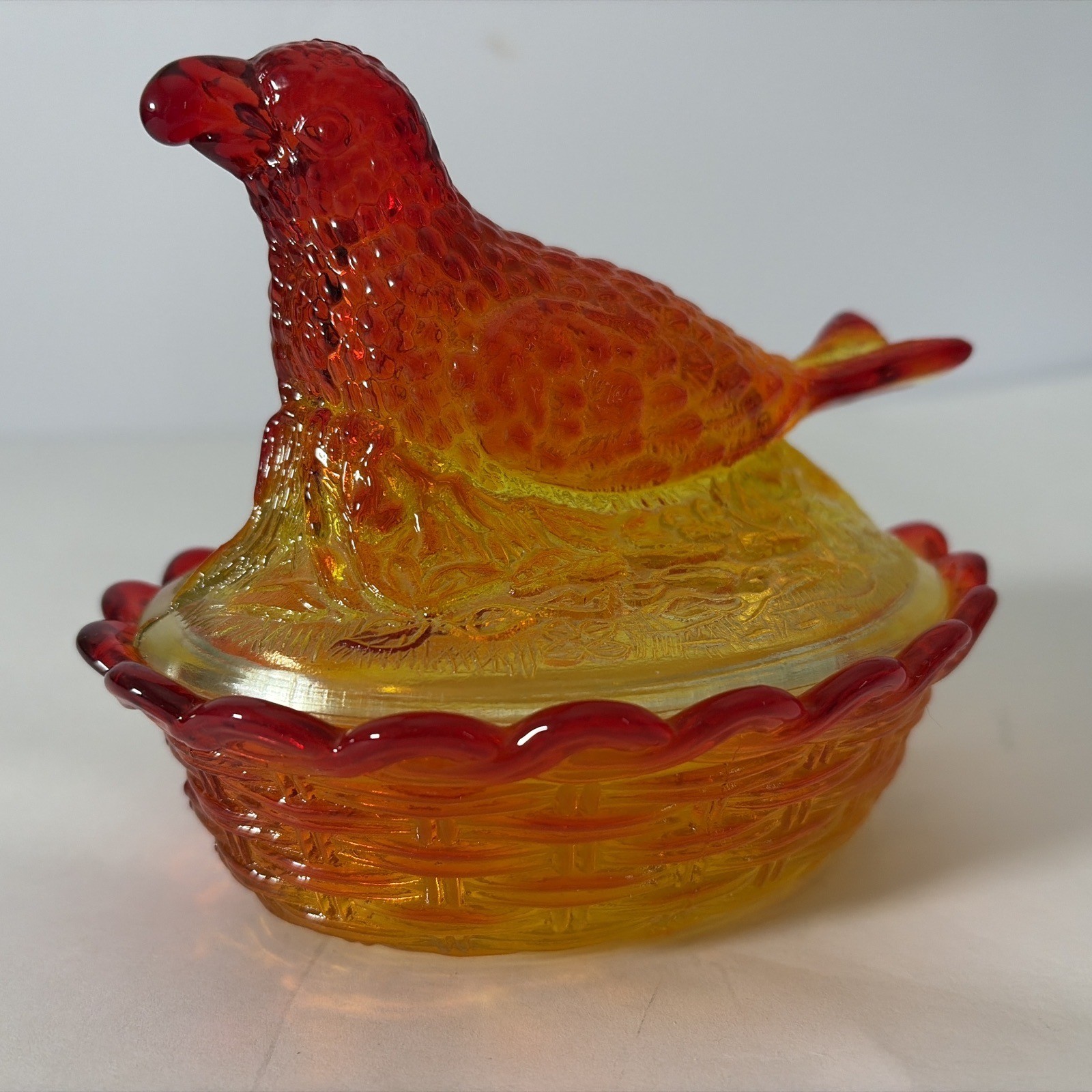 Vintage LG Wright Amberina Glass Bird w/Berry on Nest-Basketweave Base-Reactive
