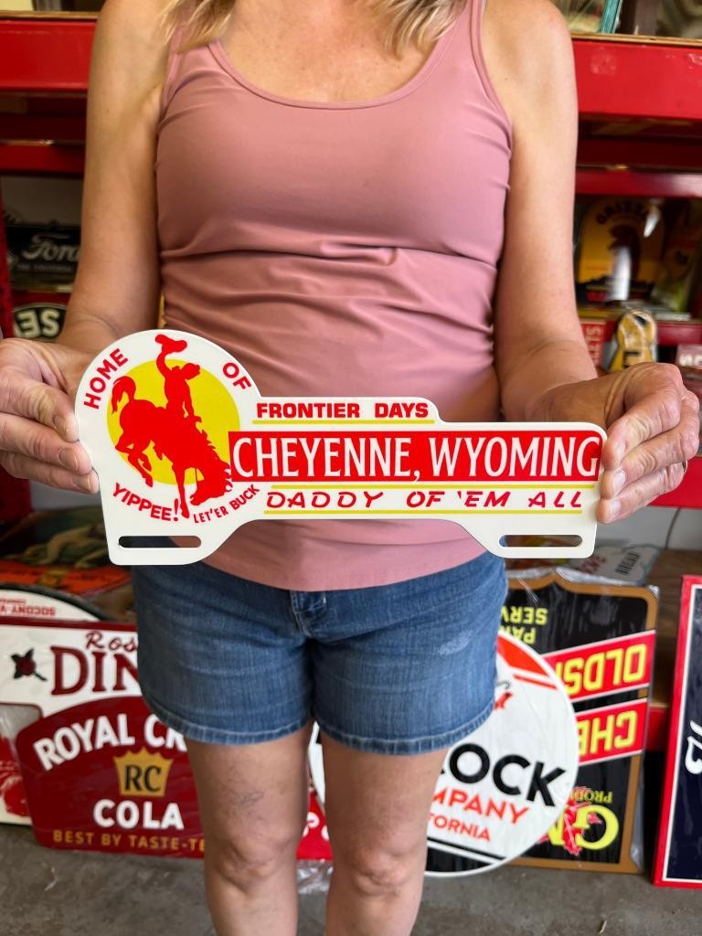 Vintage Style Metal License Topper Cheyenne Frontier Days NOT Porcelain USA