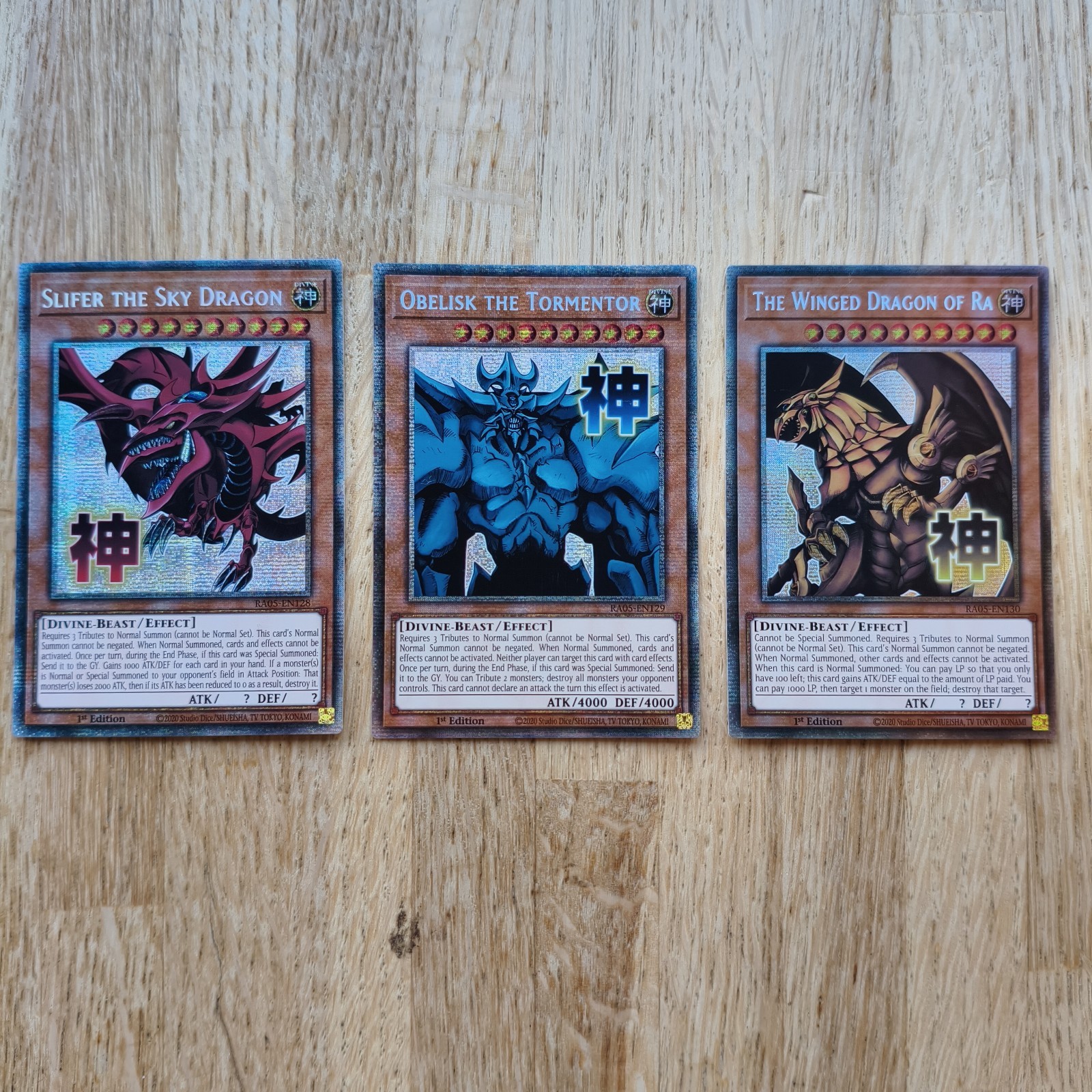 YUGIOH EGYPTIAN GOD SLIFER/OBELISK/RA STARLIGHT SET RARE RA05-EN128/129/130 NM
