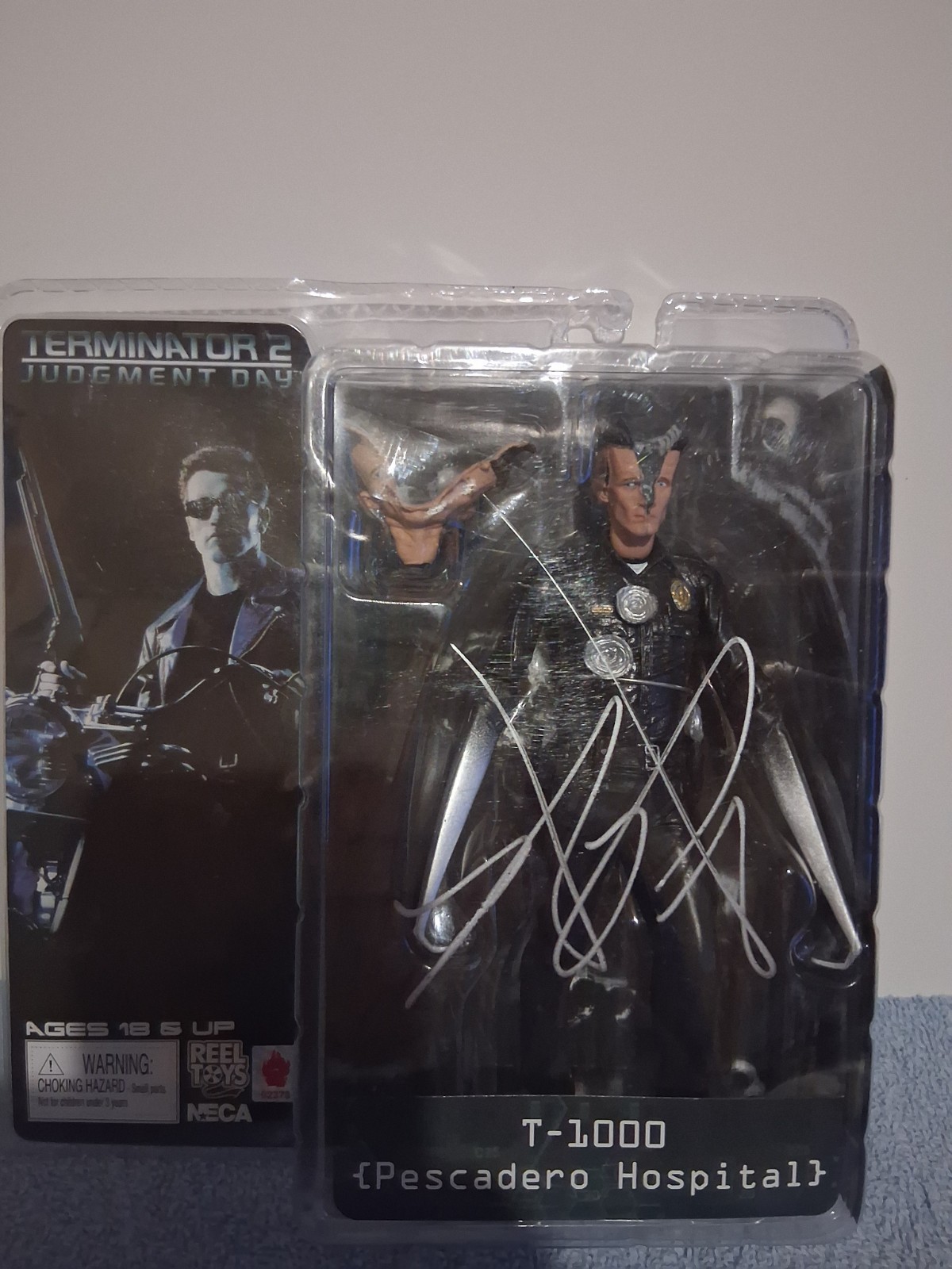 Robert Patrick Signed T-1000 NECA Action Figure Comes With COA Robert Patrick Signed T-1000 NECA Action Figure Comes With COA
