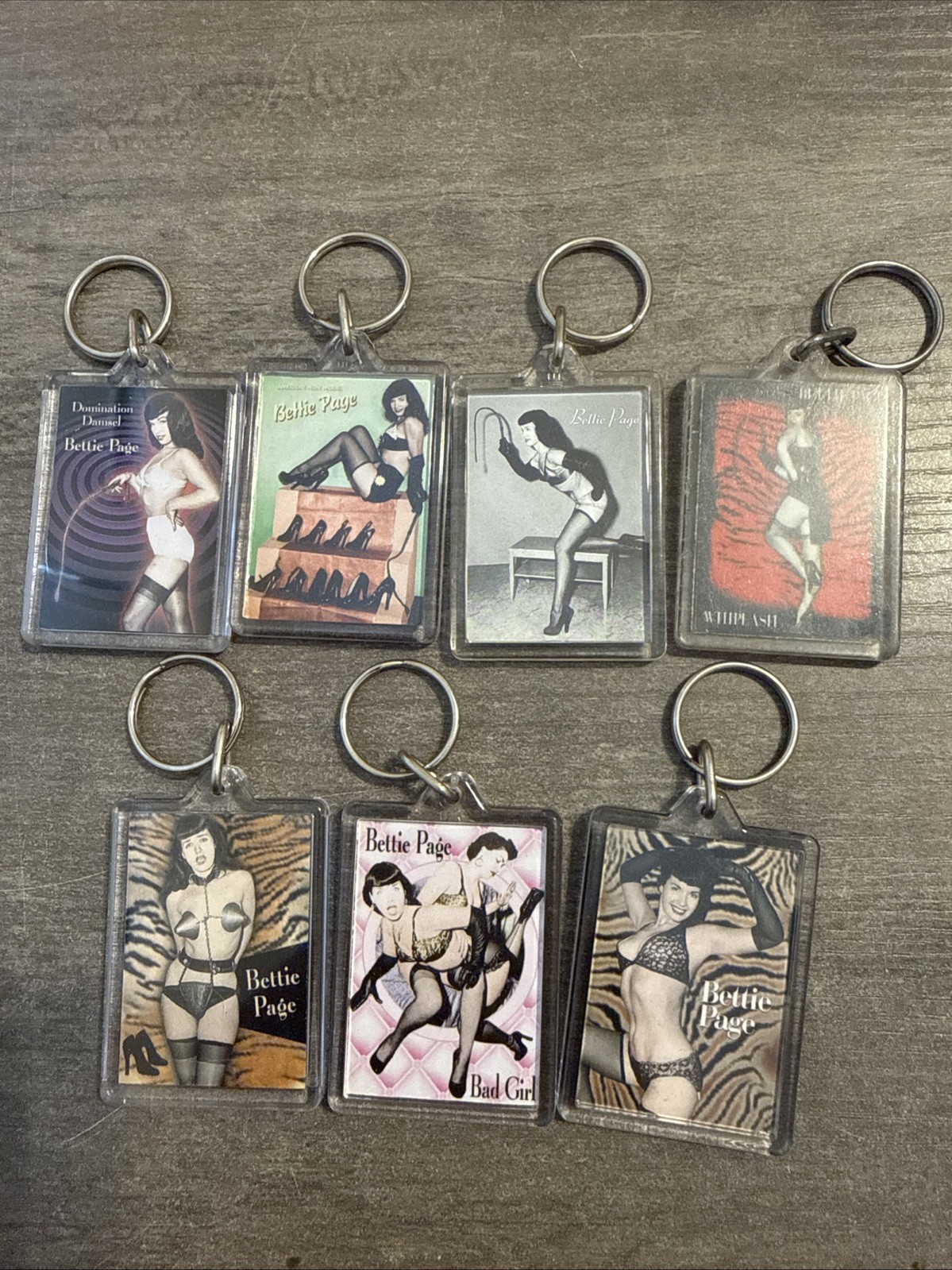 Lot Of 7 Vintage Bettie Page - Keychains Pinup Girl