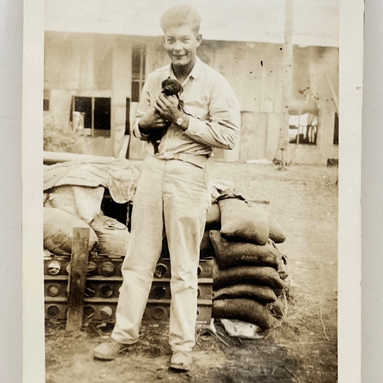 1945 Handsome Young Man Soldier Holding Puppy Dog WWII Military Snapshot Photo