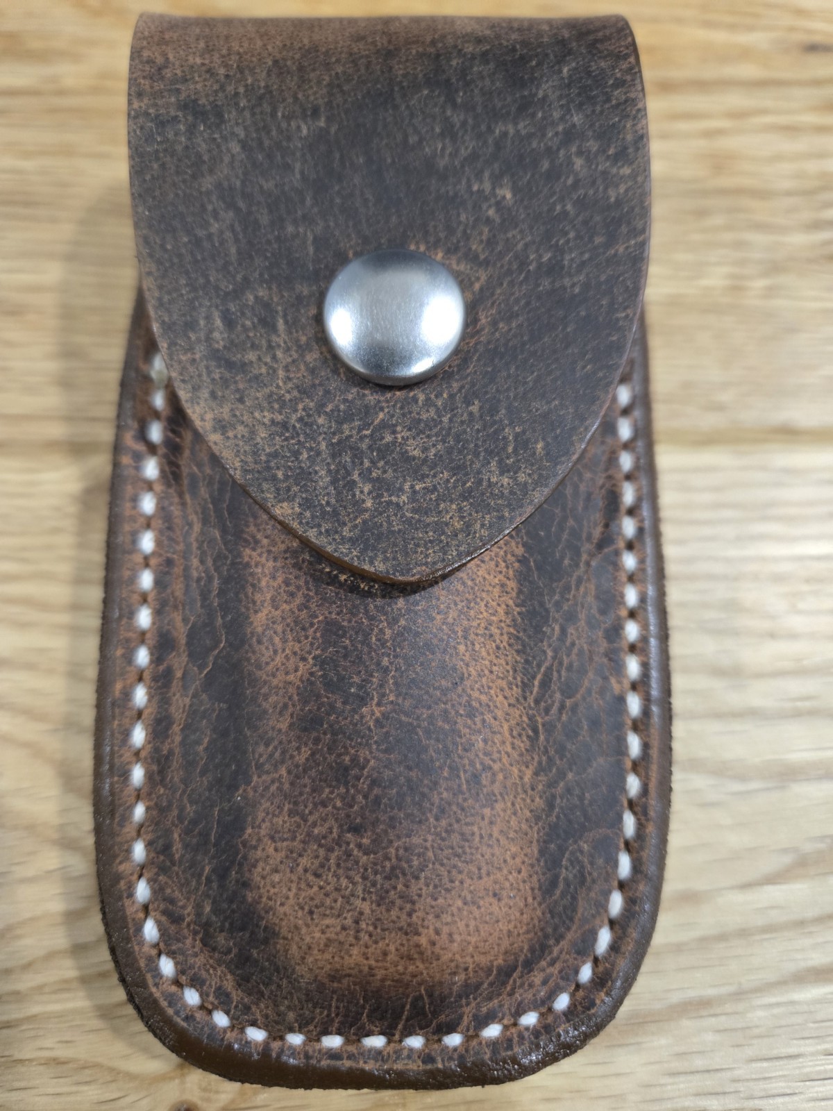 Buck 112 Distressed leather knife sheath. Brown. Plain flap. Sheath only
