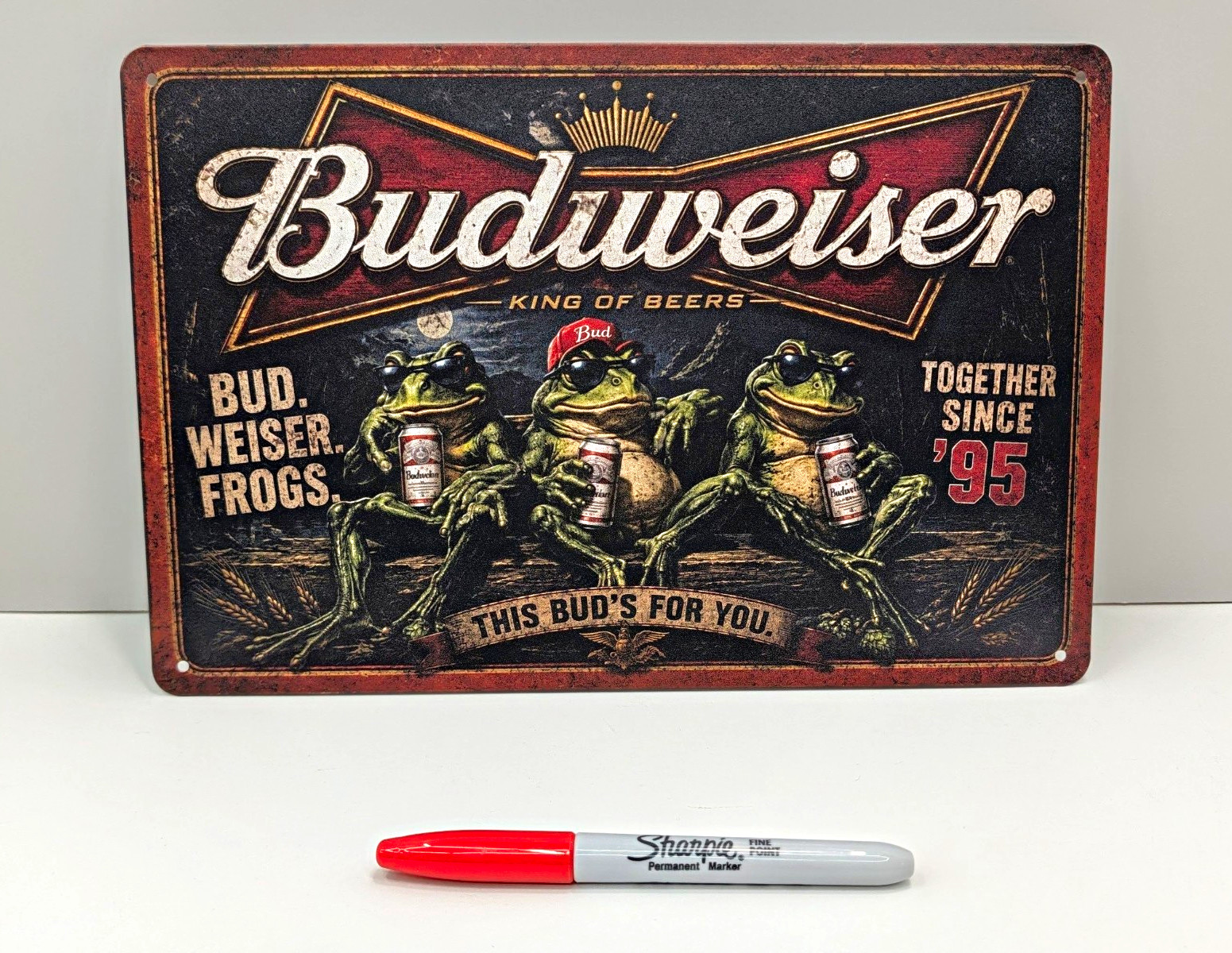 Budweiser Frogs Together Since \'95 Tin Sign This Bud\'s For You.  12 in by 8 in