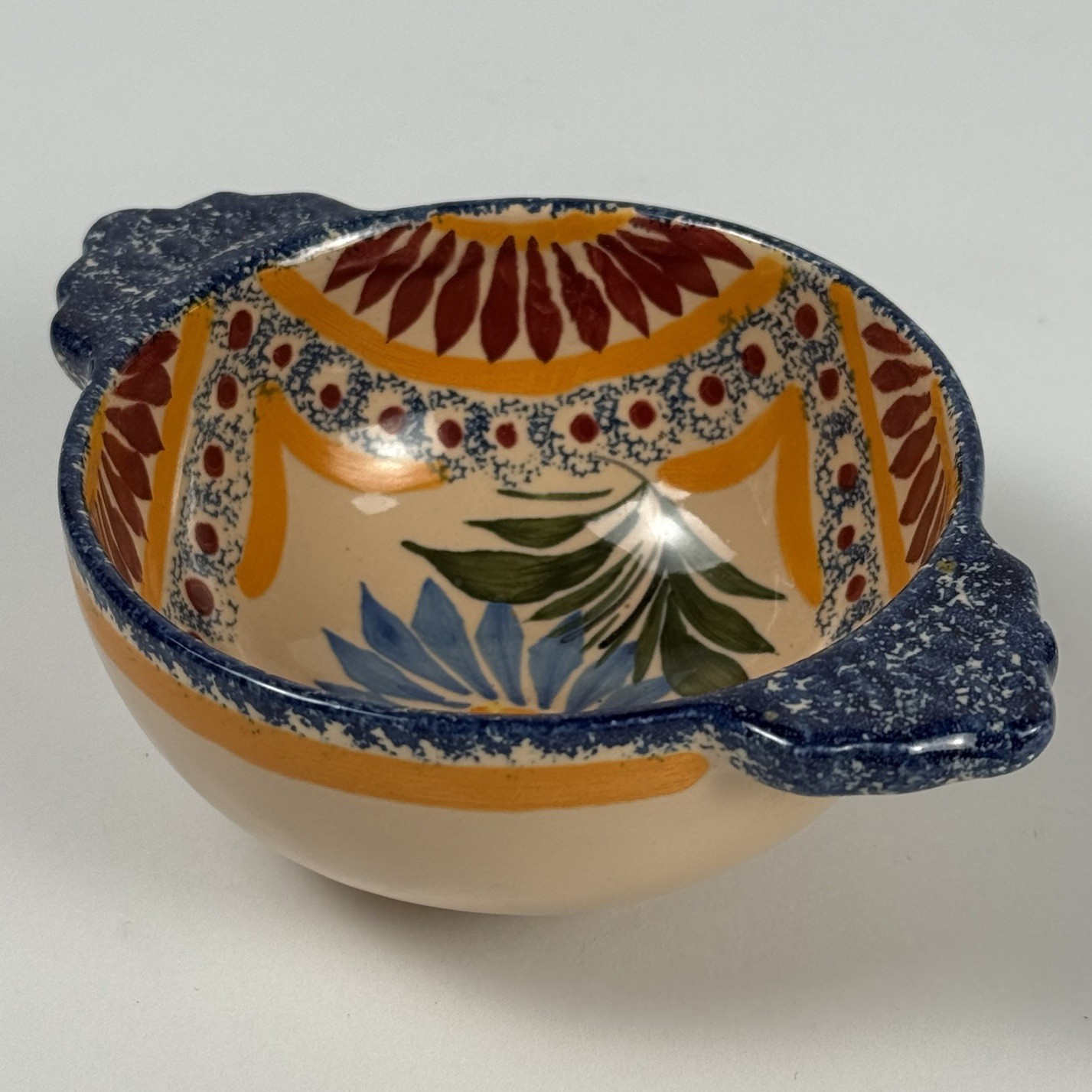 Henriot Quimper France 4” Lug Sauce Bowl with Handles Signed by Artist VG Henriot Quimper France 4” Lug Sauce Bowl with Handles Signed by Artist VG