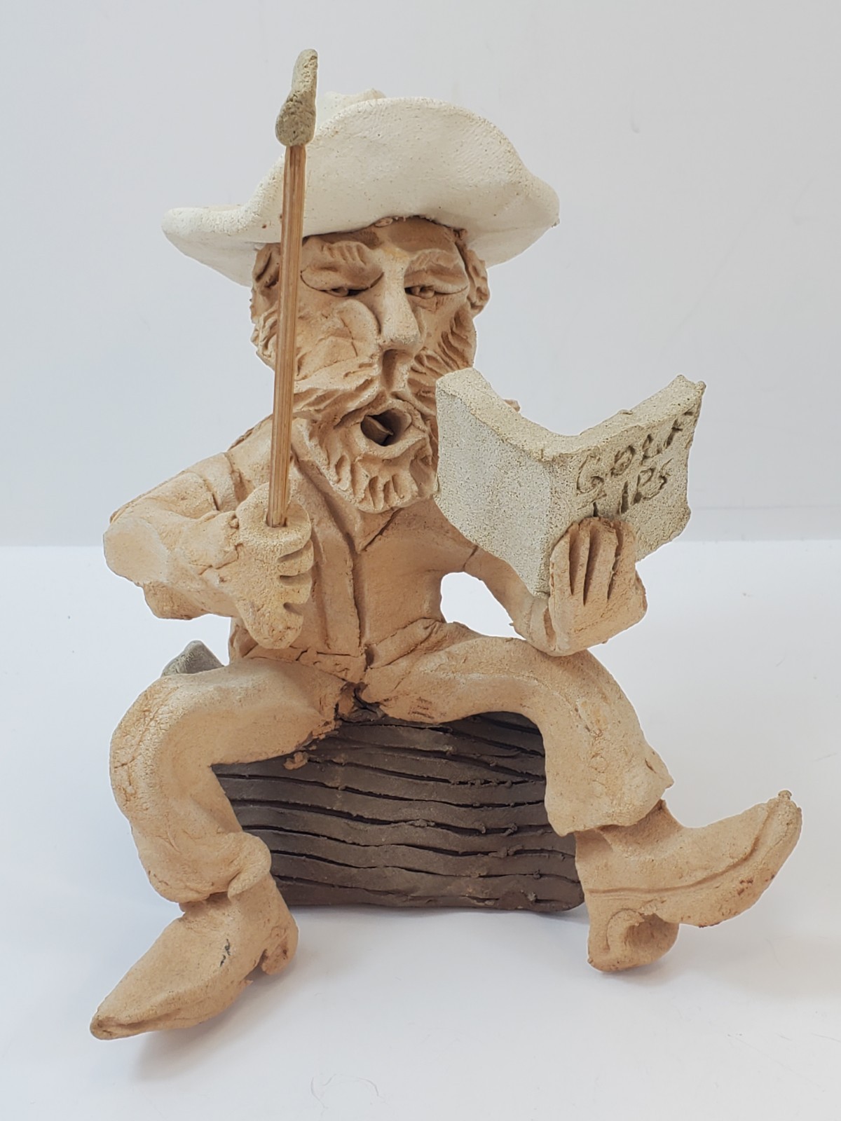 Vintage Clay Sculpture Golfer Sitting On Log Reading Signed by Tom Schoolcraft 