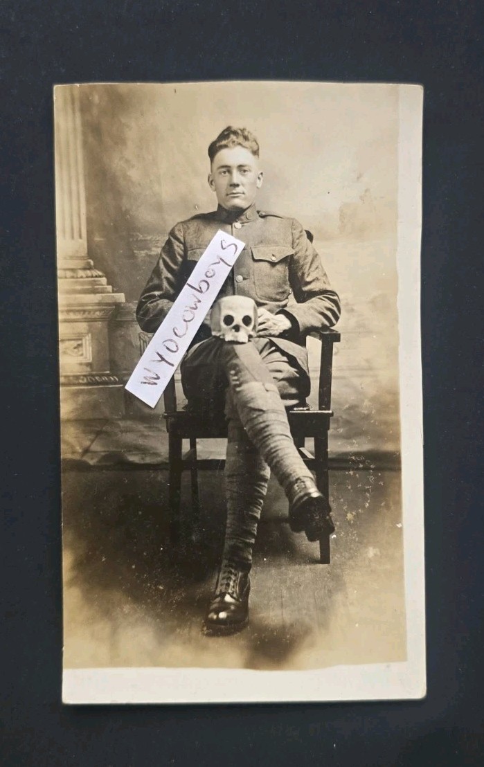 1910s WWI Soldier Holding Skull RPPC Macabre Military Studio Portrait Oddity