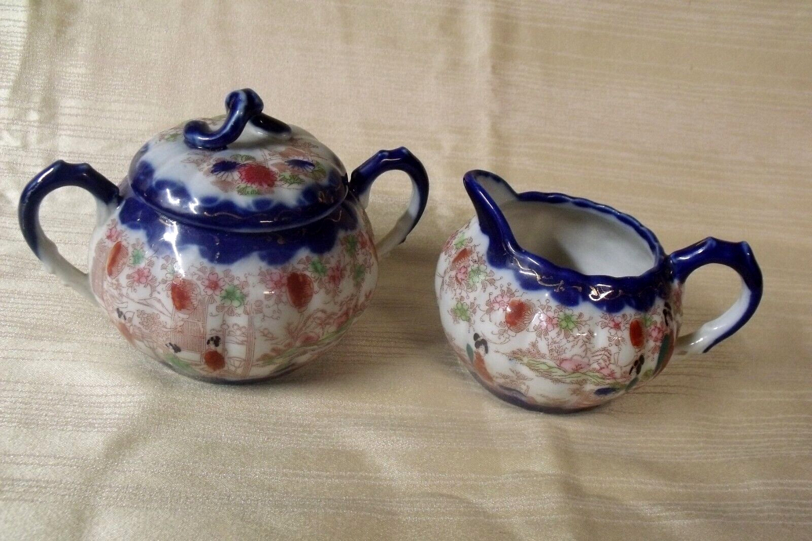 PRETTY ANTIQUE NIPPON POLYCHROME HAND PAINTED PORCELAIN CREAMER AND SUGAR SET
