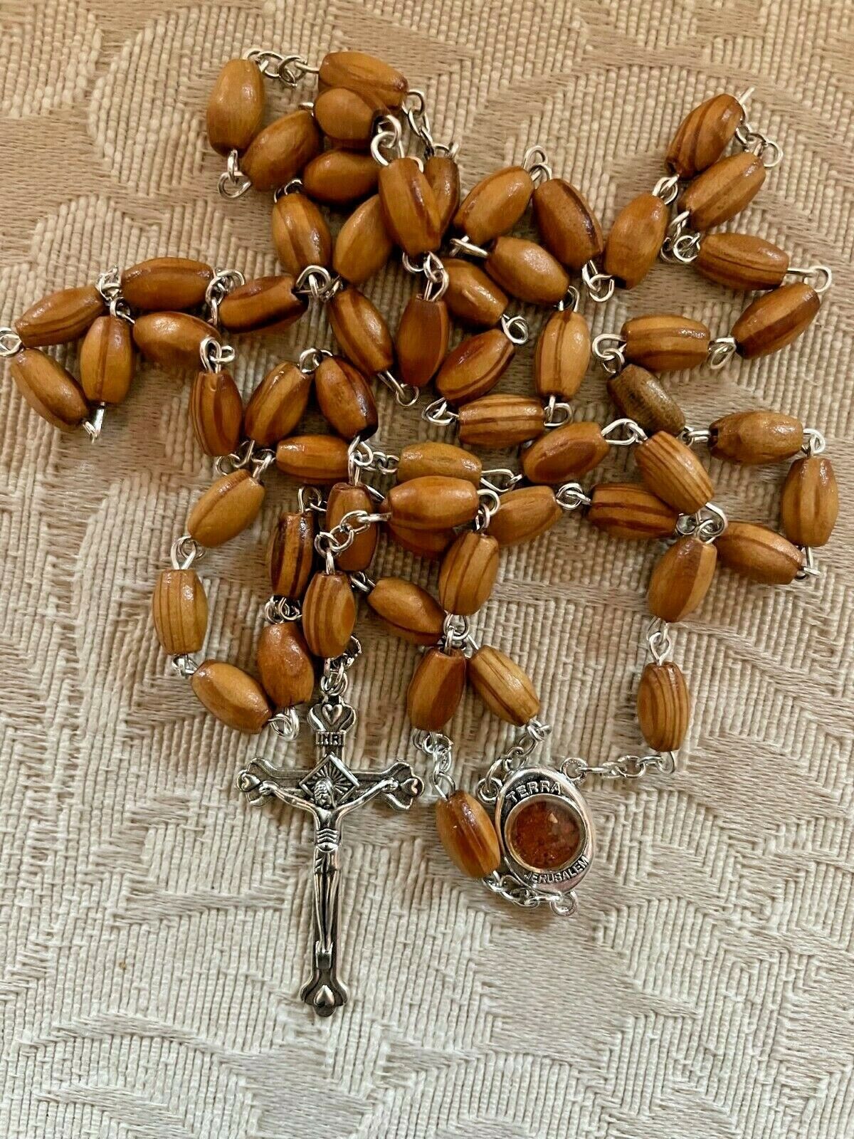 Wooden Rosary, Relic, Holy Cards & Photos Placed On Fr Patrick Peyton's Grave 