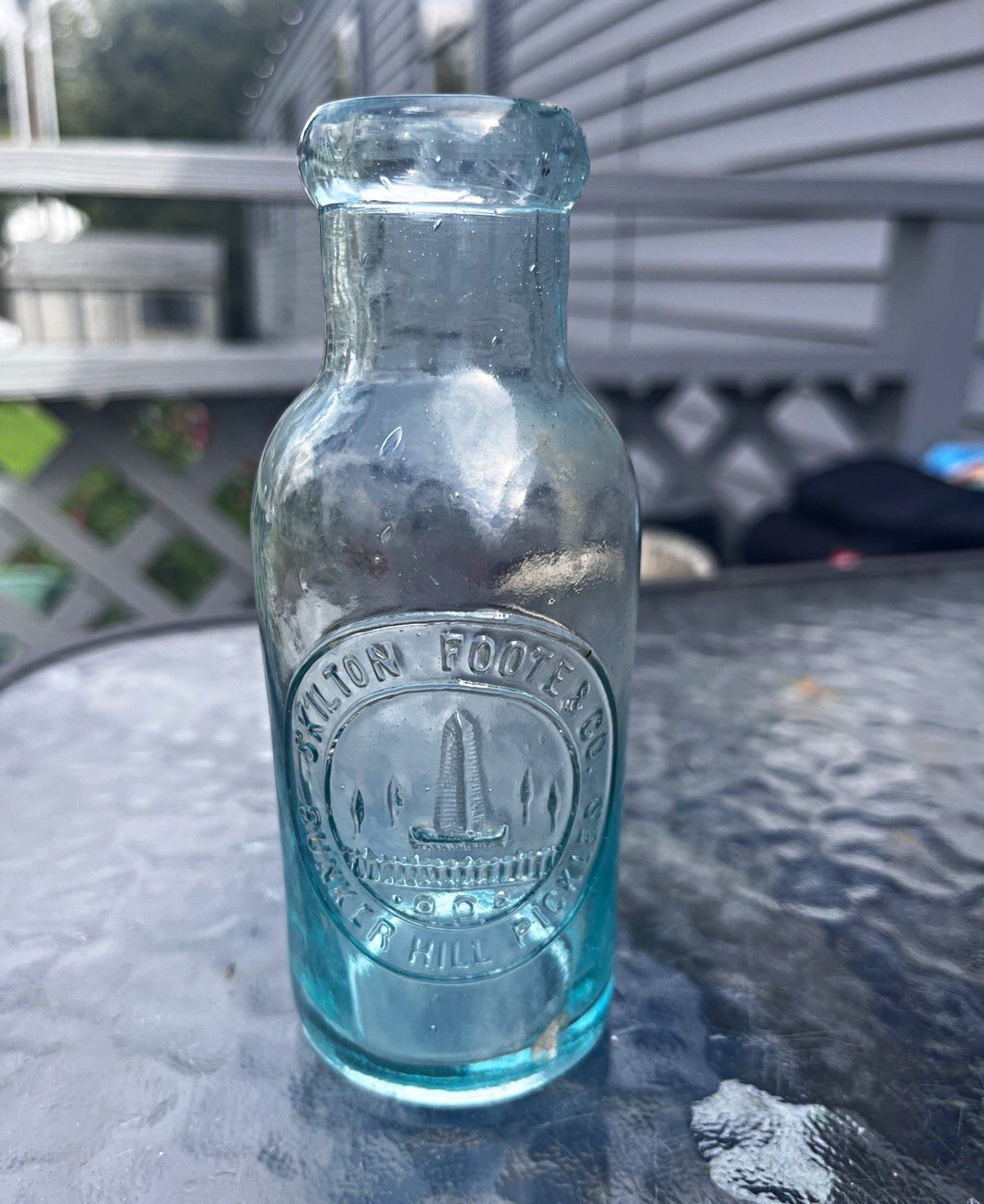 Blue Embossed Glass Bottle w/ \