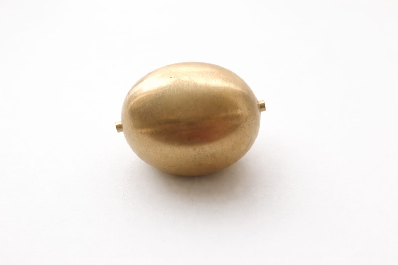 brass ball that is empty inside