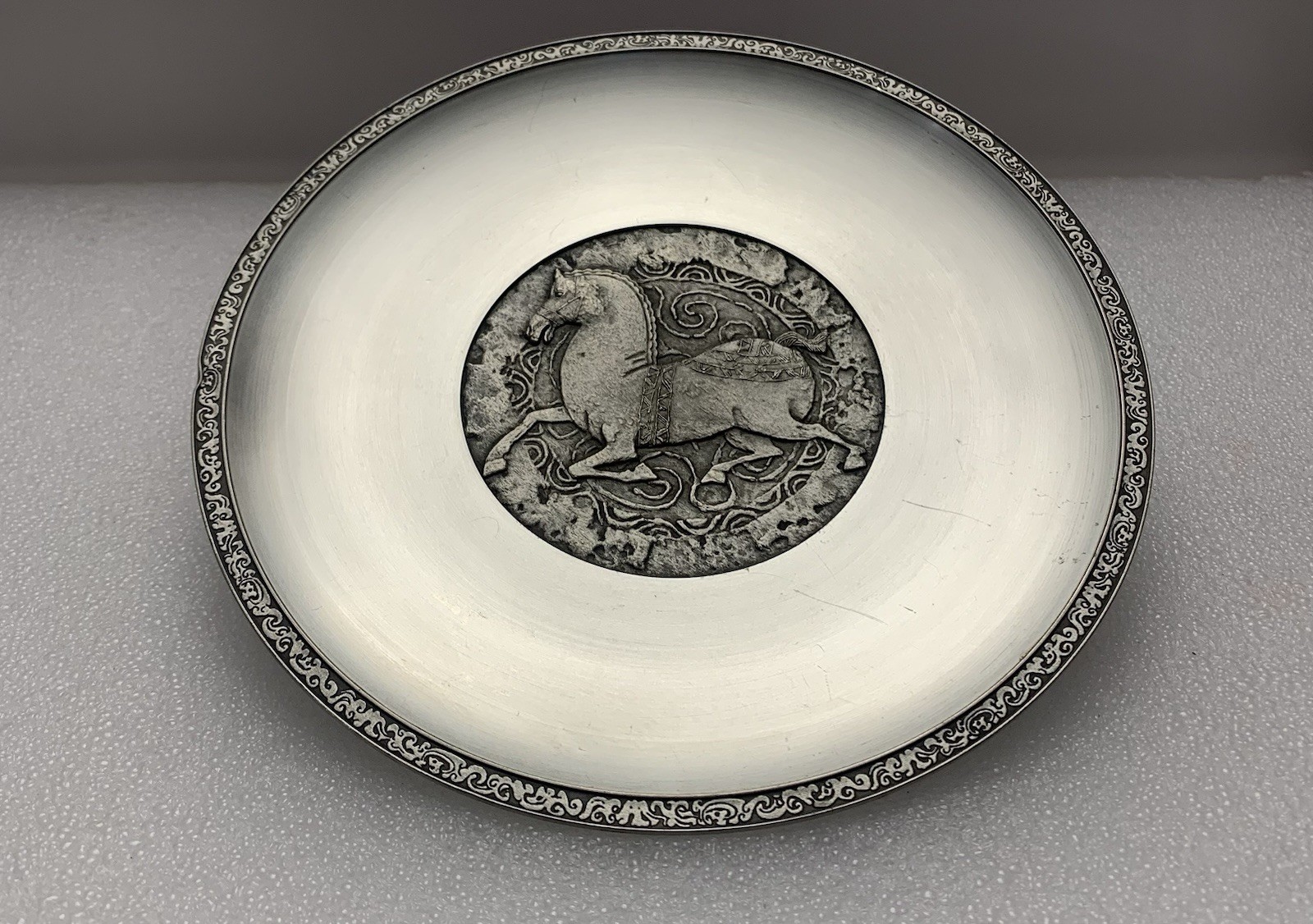 A CHINESE PEWTER ZODIAC PLATE  THE YEAR OF THE HORSE, BY ROYAL SELANGOR   1978