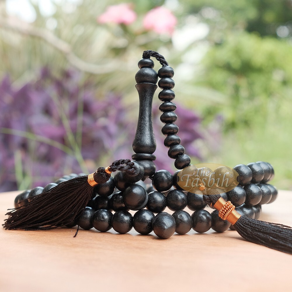 Islamic Indonesian Black 8mm Tasbih Citrus Wood with Copper-decorated Tassels Islamic Indonesian Black 8mm Tasbih Citrus Wood with Copper-decorated Tassels