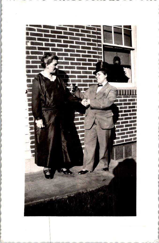 Candid Photograph of Handshake Between Women in Gender-Fluid Fashion 1940s