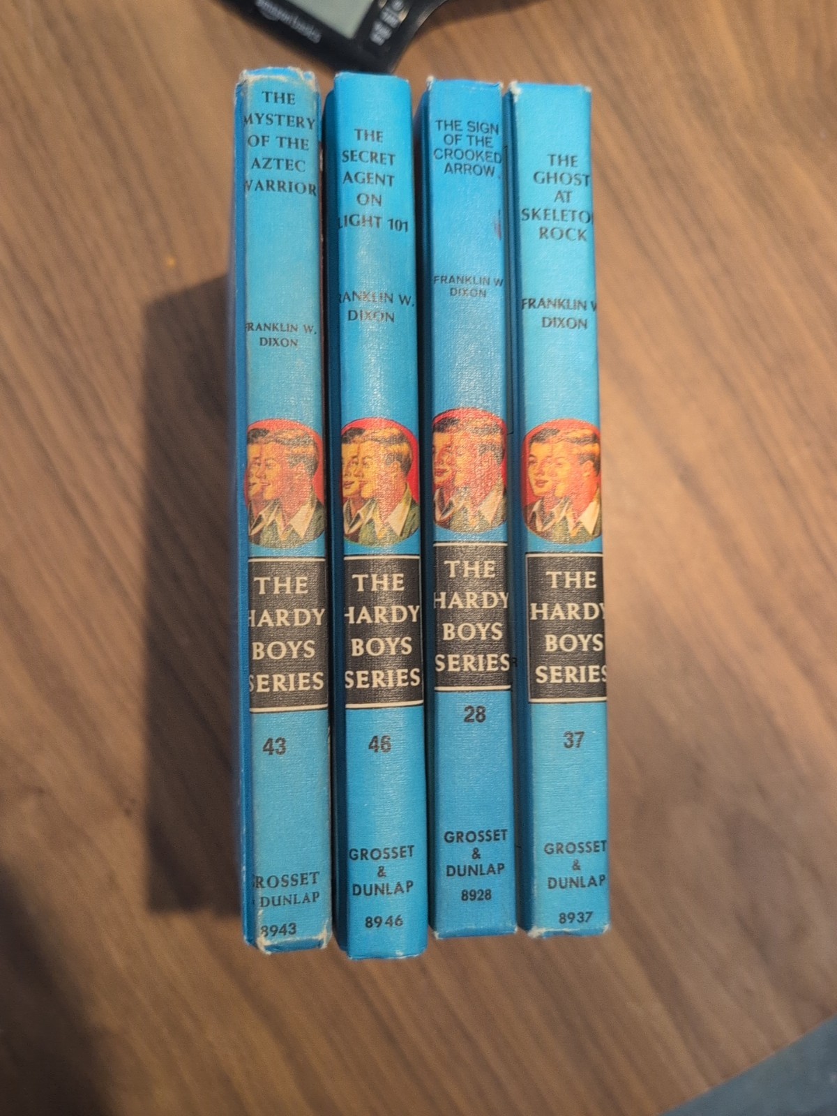 4 vintage Hardy Boys blue matte hardcover mystery books by Grosset & Dunlap