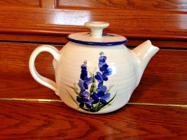HAND THROWN BLUE FLORAL LIDDED TEAPOT CREAM W/BLUE HAND THROWN BLUE FLORAL LIDDED TEAPOT CREAM W/BLUE