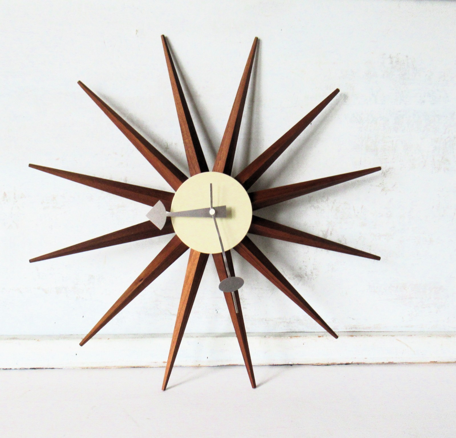 Vintage George Nelson style starburst wall clock it needs a new movement or hand Vintage George Nelson style starburst wall clock it needs a new movement or hand