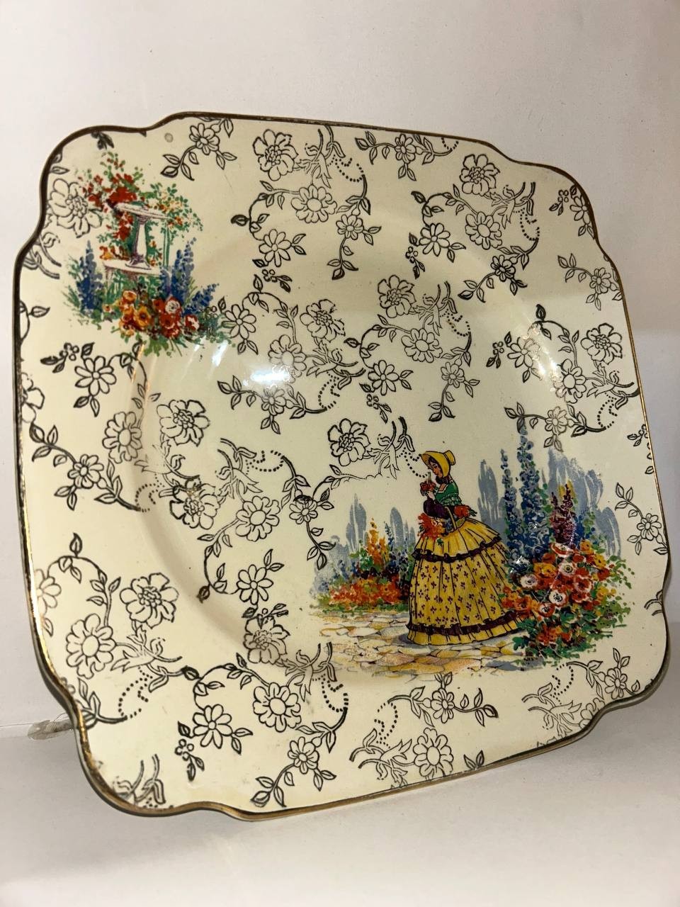 This item is an Empire 1039 Square Tea Plate, featuring the \ This item is an Empire 1039 Square Tea Plate, featuring the \