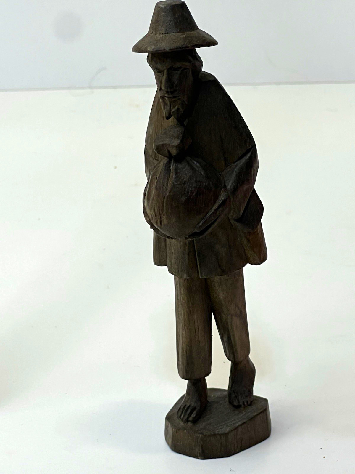 Vintage Carved Dark Wooden Barefoot Man Figurine Holding Sack Brown 6” Folk Art Vintage Carved Dark Wooden Barefoot Man Figurine Holding Sack Brown 6” Folk Art