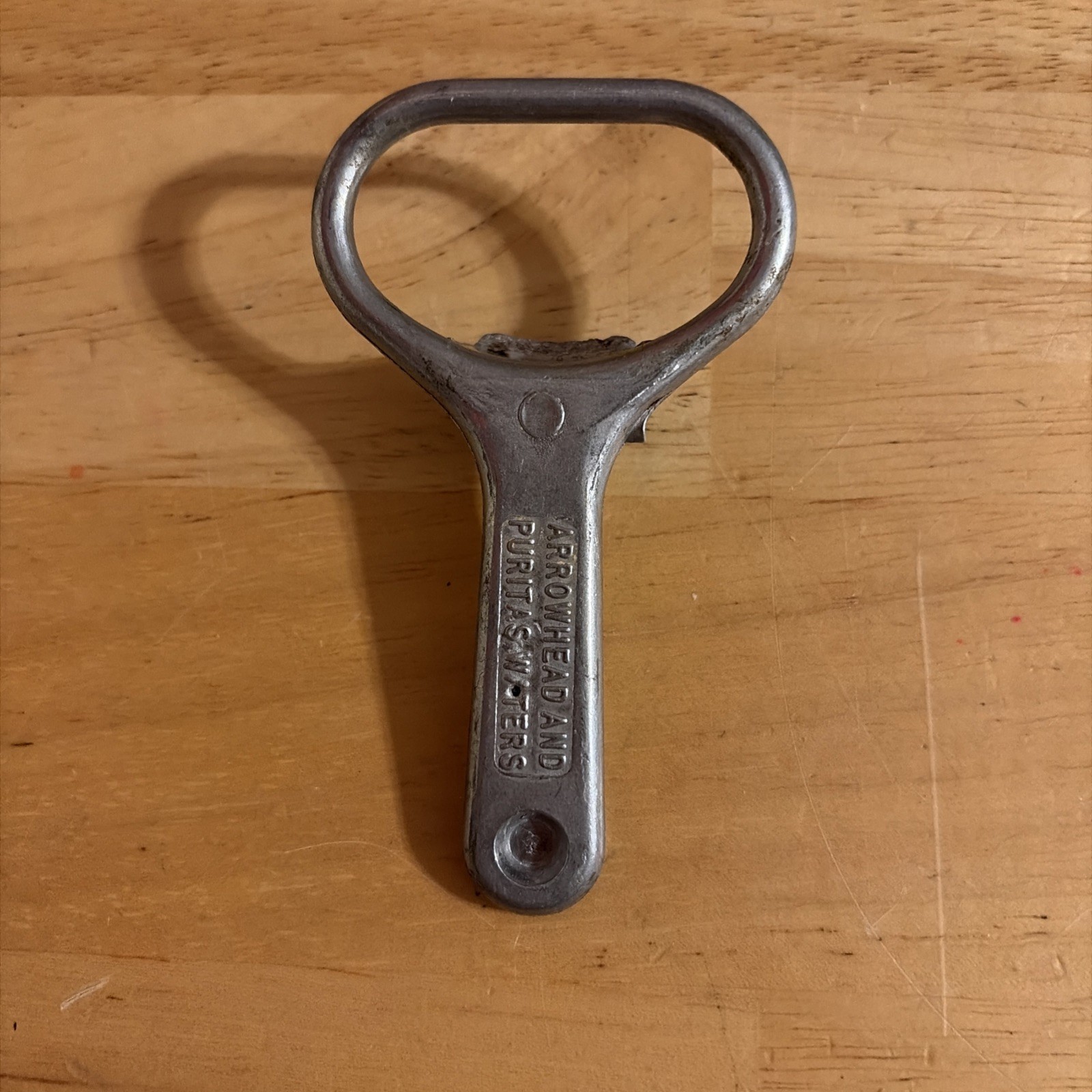 Vintage Arrowhead and Puritas Waters Large Mouth Advertising Bottle Opener