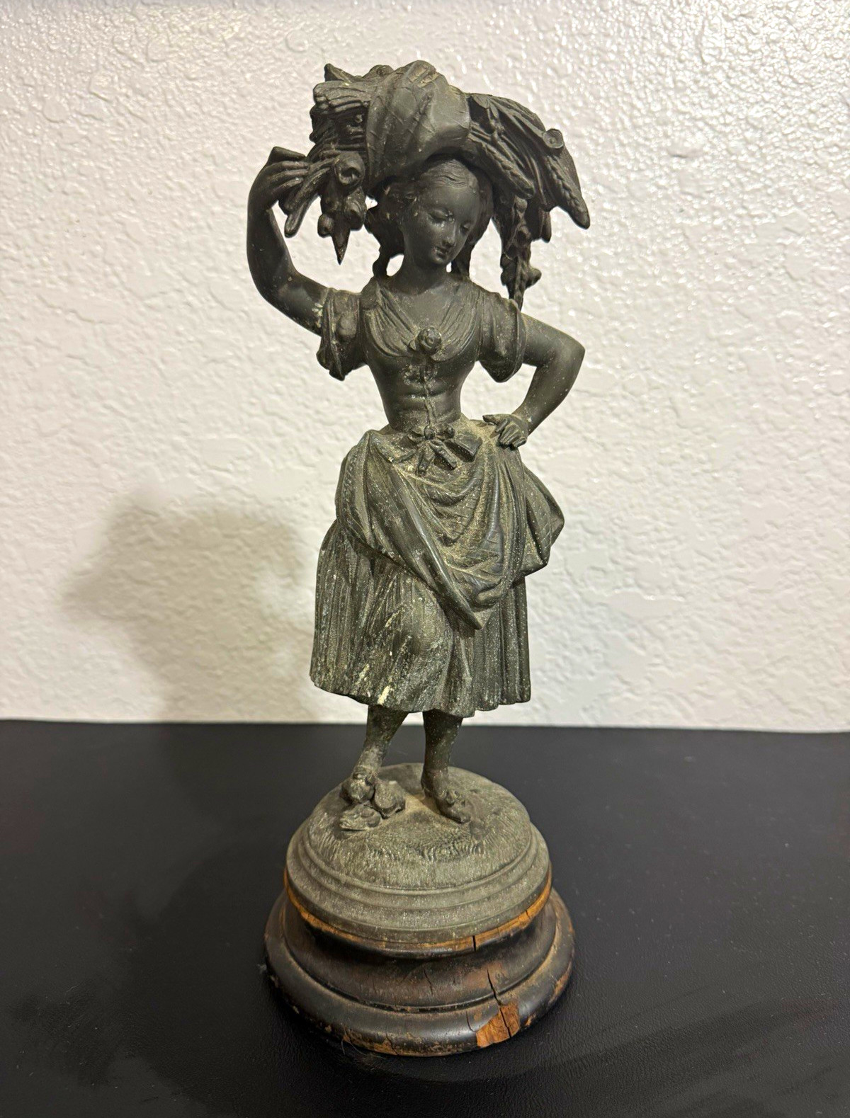 Antique Spelter Figurine with original wood spin base