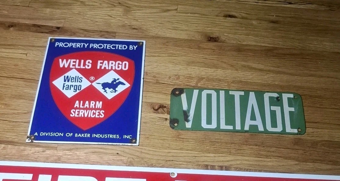 Lot Of 2 Vintage Enameled Porcelain Signs Wells fargo Voltage 
