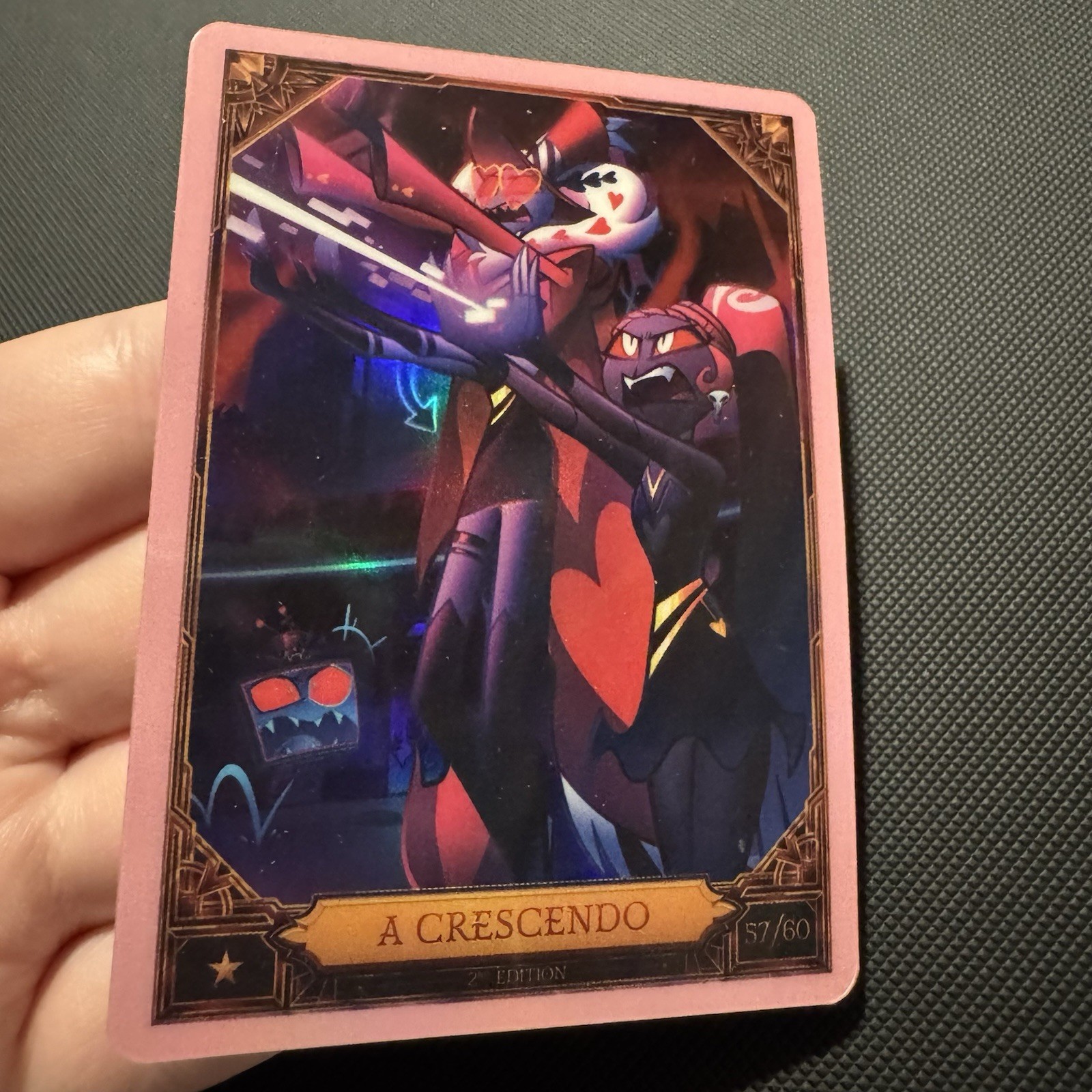 Hazbin Hotel A Crescendo FOIL Optichrome 2nd Edition Trading Card #57/60 Pink