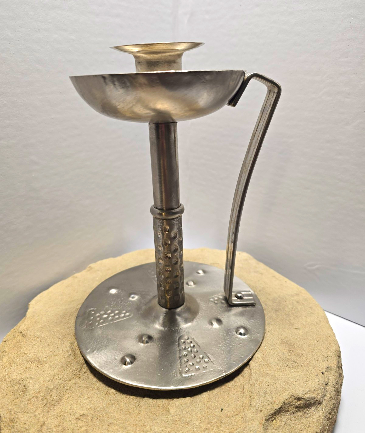 Antique Hugo Berger Hammered Iron Candlestick holder made in Germany in 1910-15 Antique Hugo Berger Hammered Iron Candlestick holder made in Germany in 1910-15