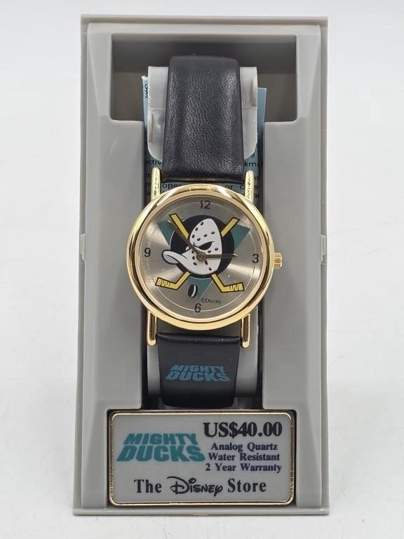 Vintage DISNEY  MIGHTY DUCKS WATCH WITH ROTATING PUCK IN CASE.