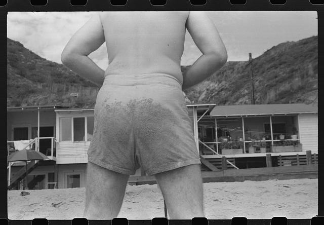 Photo:1930s Beach Man Back View Shorts Houses Hillside Photo