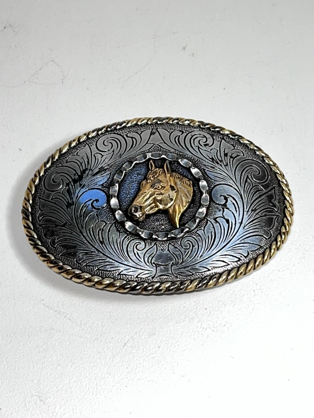 Horse head centered on western mixed metal belt buckle beautiful flower swirl Horse head centered on western mixed metal belt buckle beautiful flower swirl