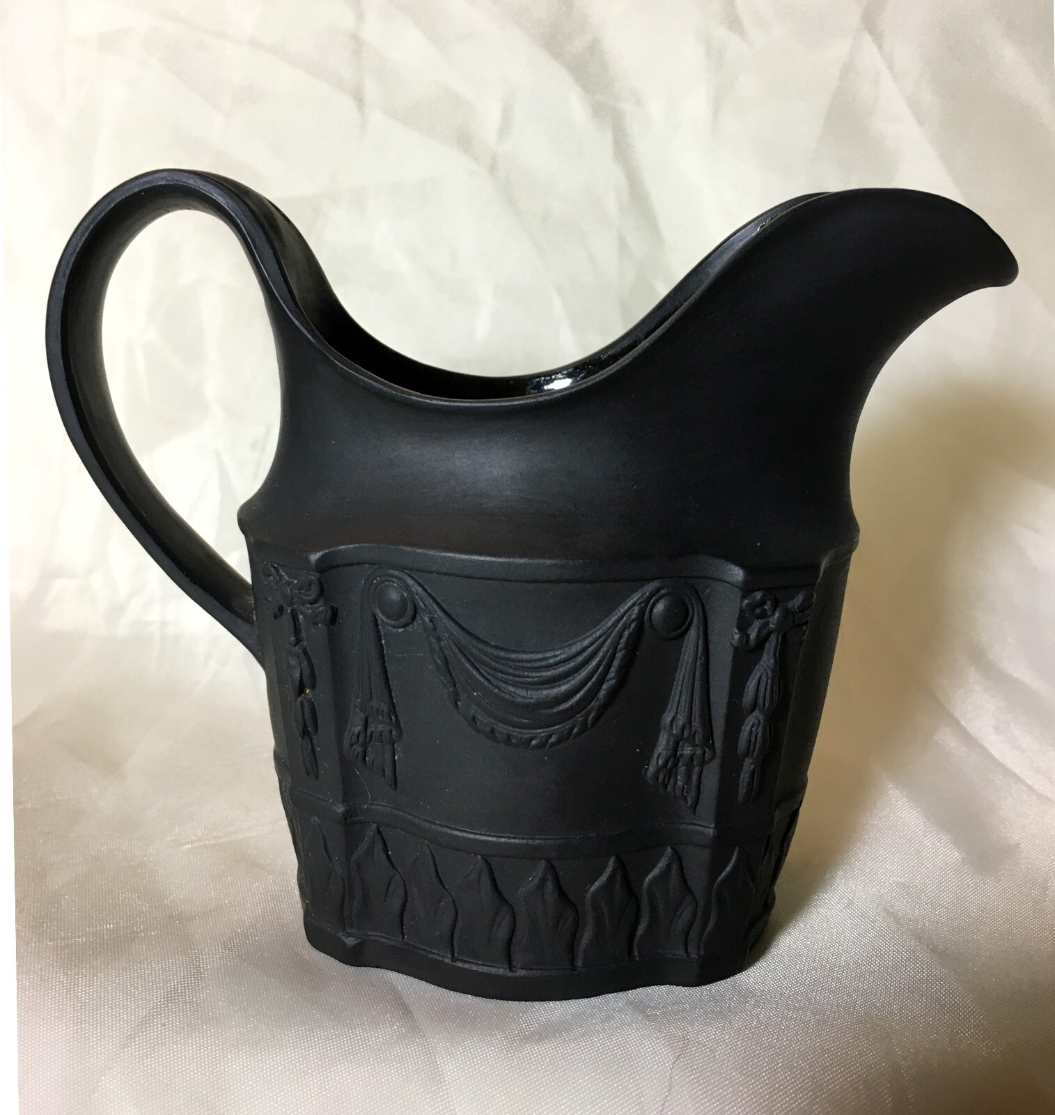 C1790 BASALT MILK JUG WITH DRAPE CAMEOS