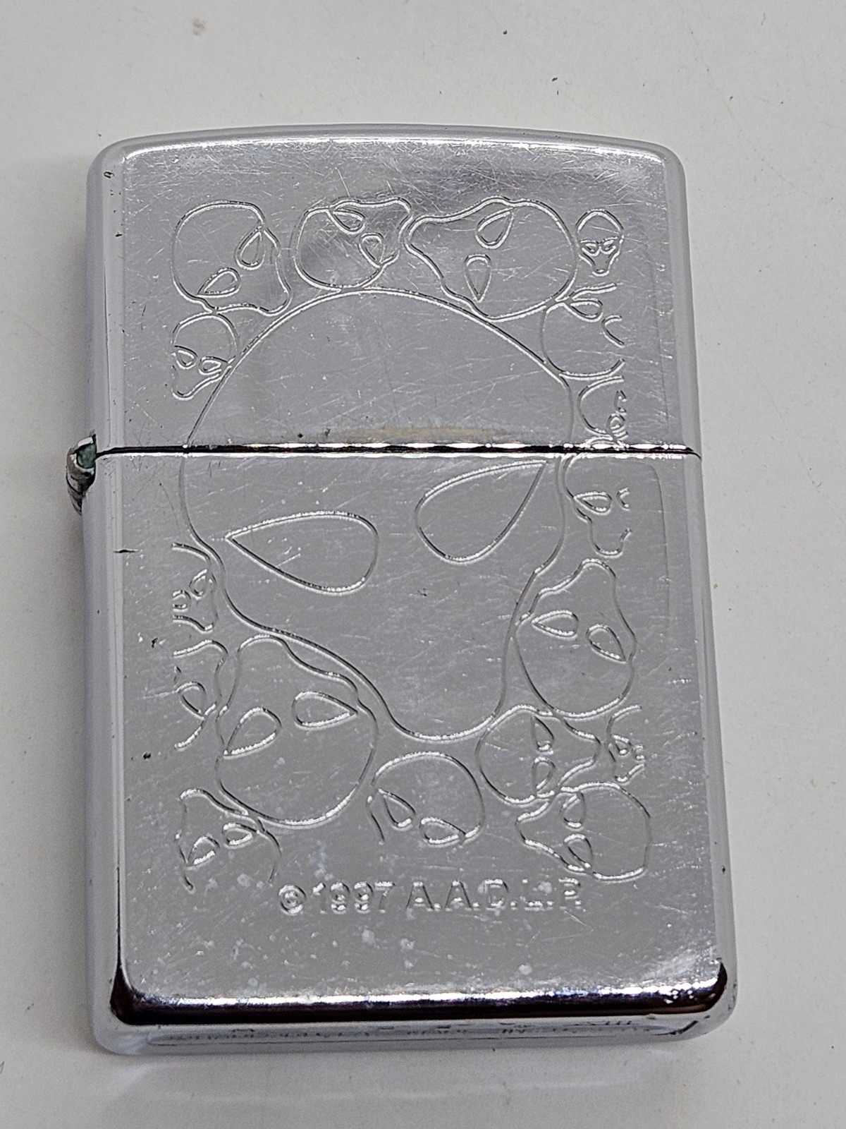 Rare Vintage 1997 ZIPPO Chrome Lighter AADLP with Alien Head Graphics A.A.D.L.P.