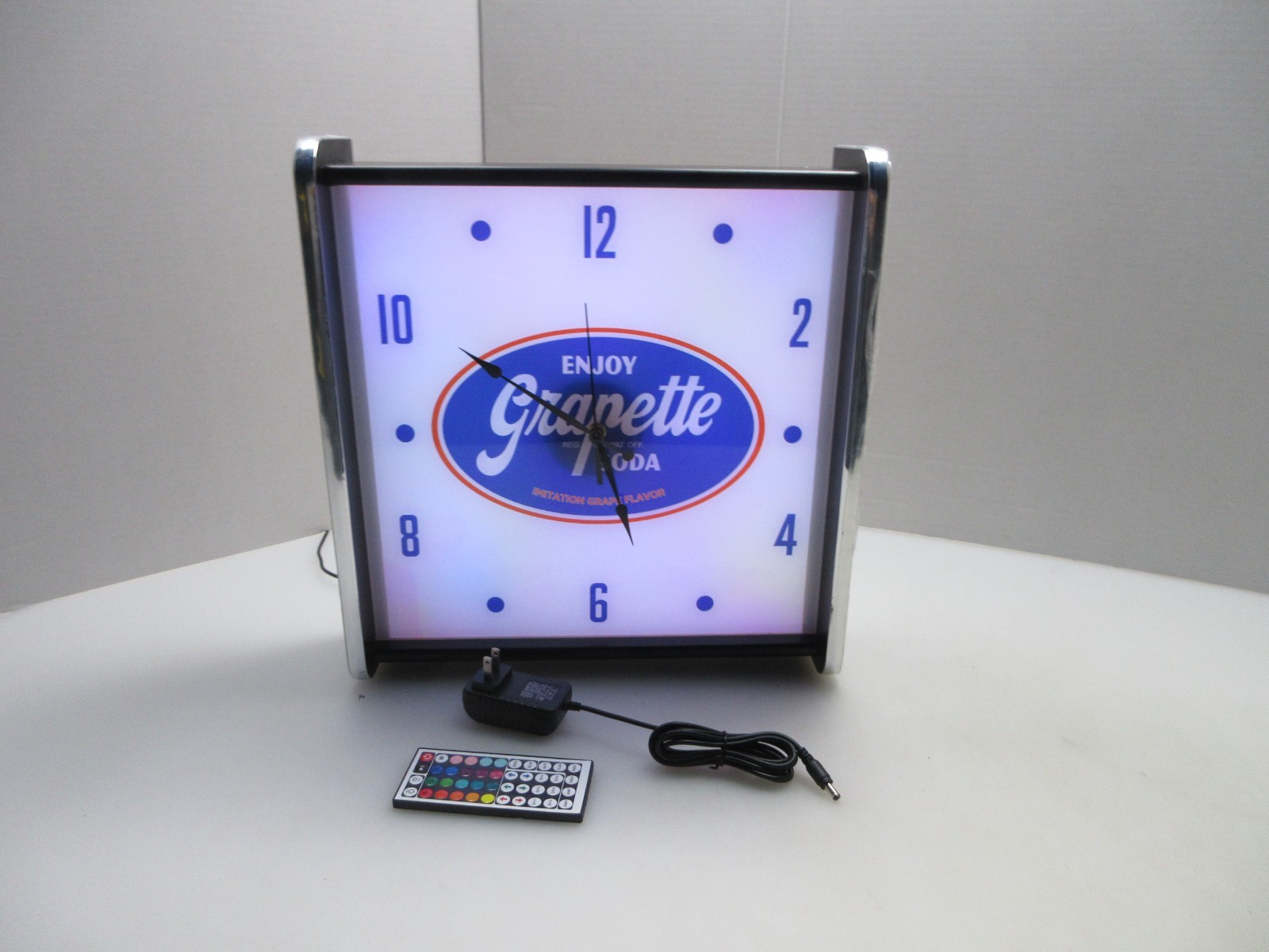 Enjoy Grapette Soda LED light up Advertising wall clock Brand New Enjoy Grapette Soda LED light up Advertising wall clock Brand New