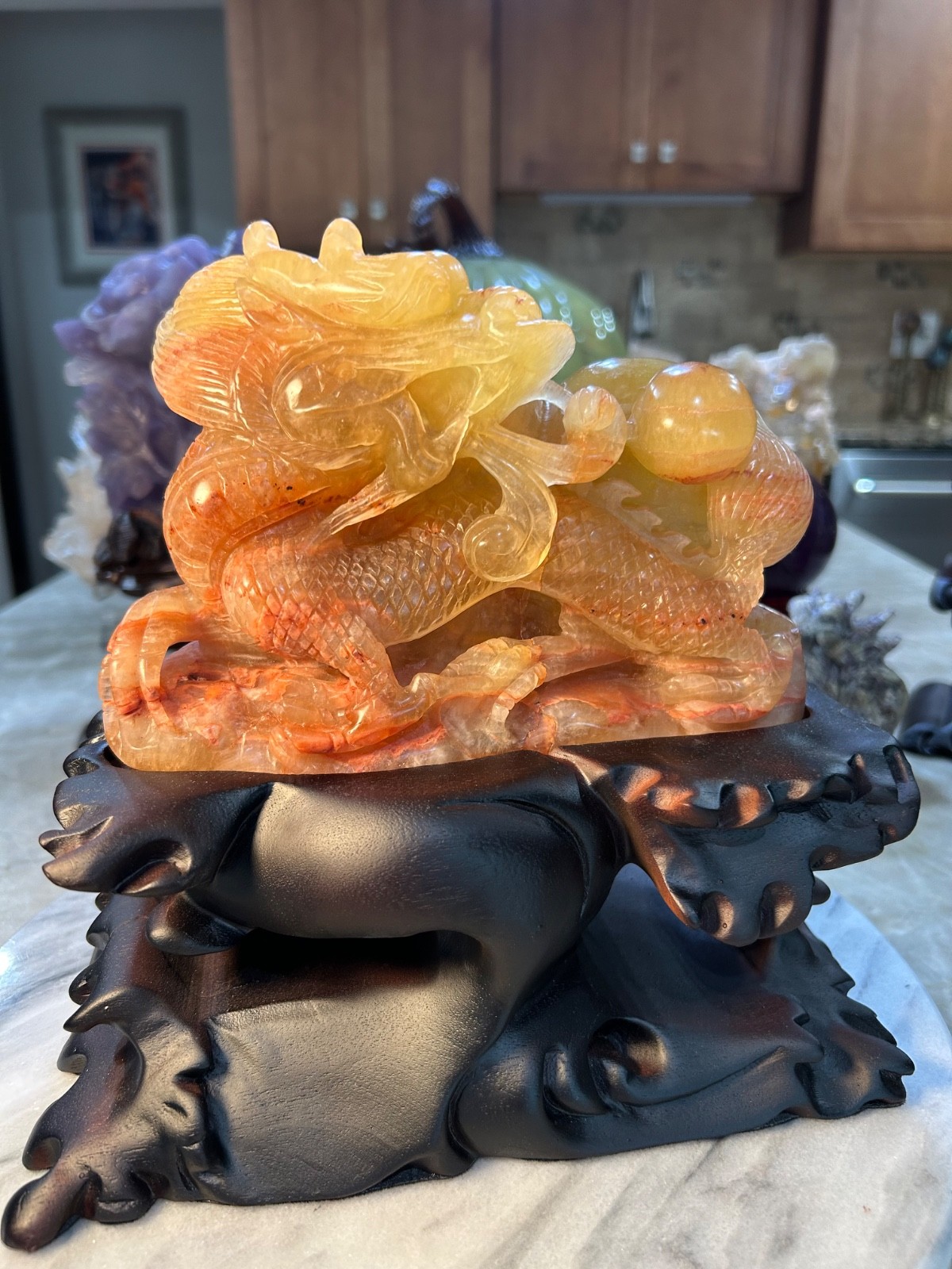 Dragon yellow Fluorite with gourd UV reactive carving with custom wood stand
