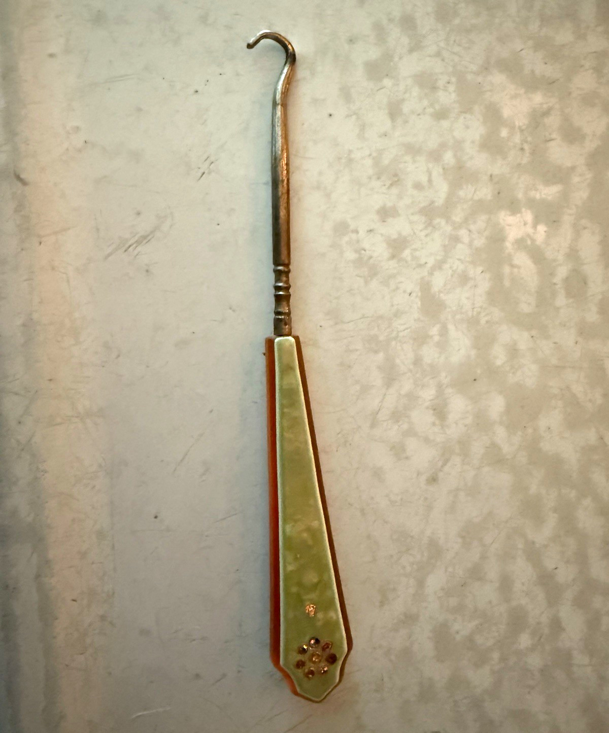 Vintage Metal Button Hook Tool Celluloid Orange Handle Green Inlay Rhinestone