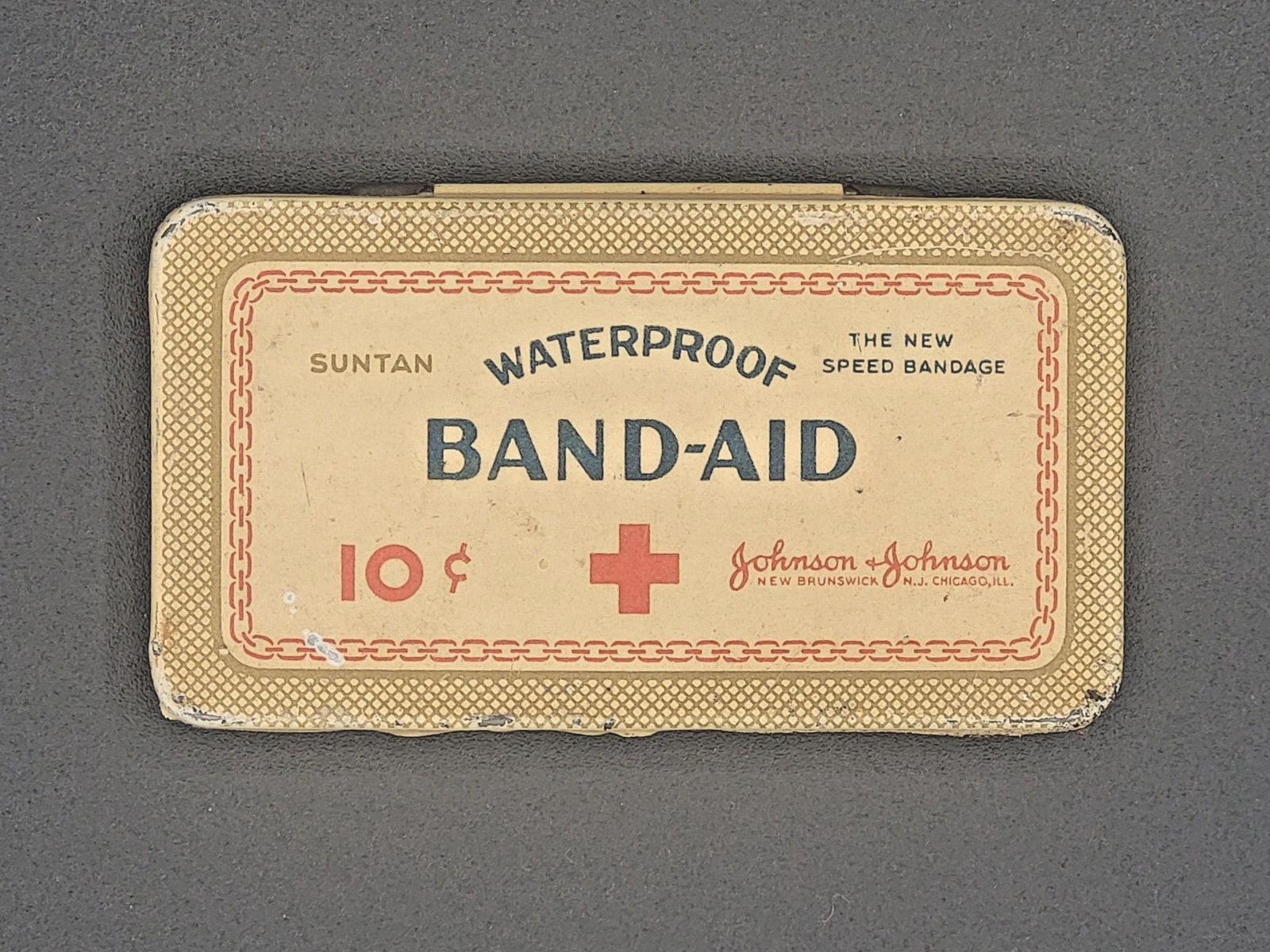 1920s Johnson & Johnson Band‑Aid Tin – Suntan Waterproof – Vintage