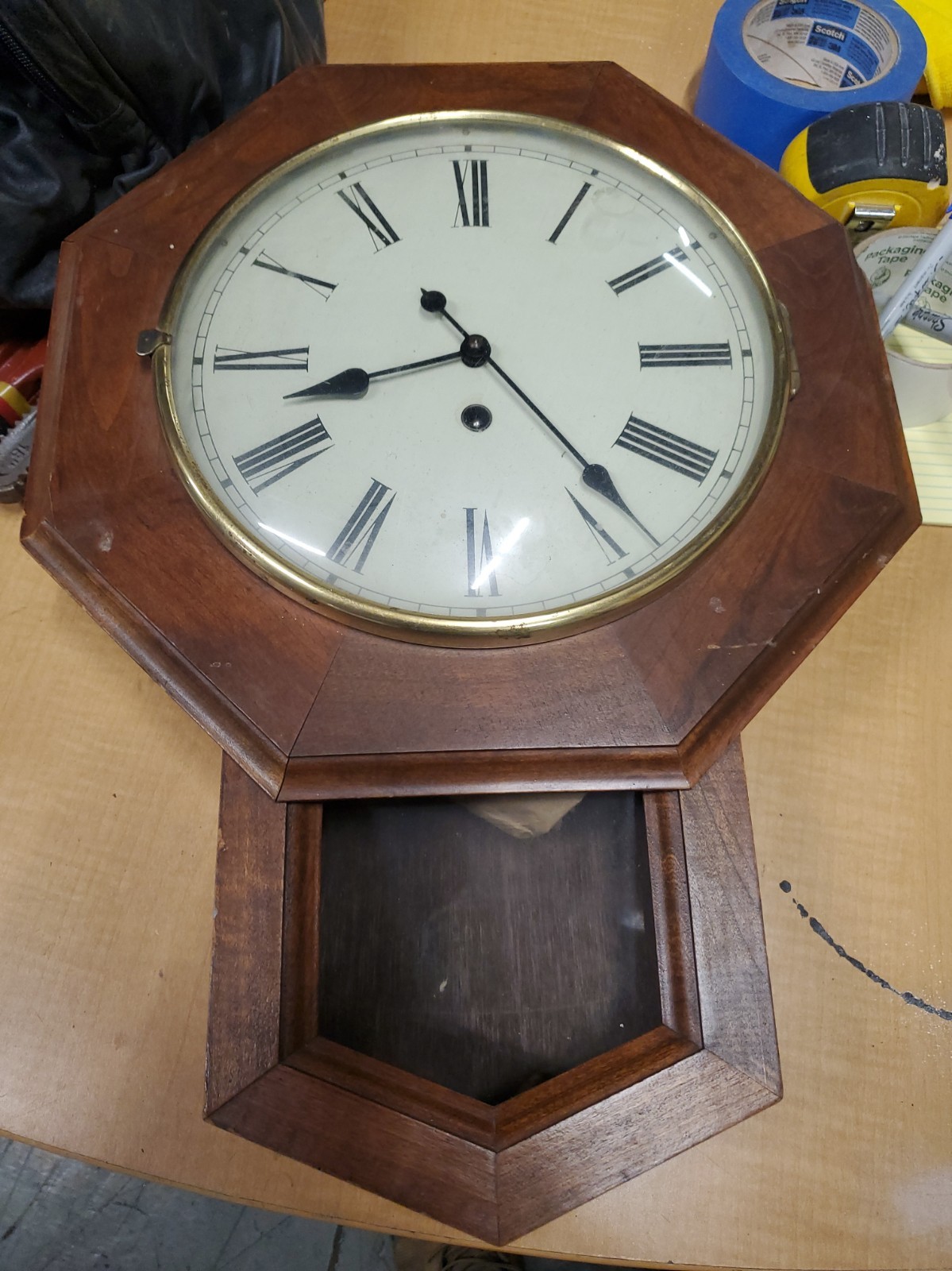 Antique DROP OCTAGON SCHOOL HOUSE BRASS STRAPPING WALL CLOCK