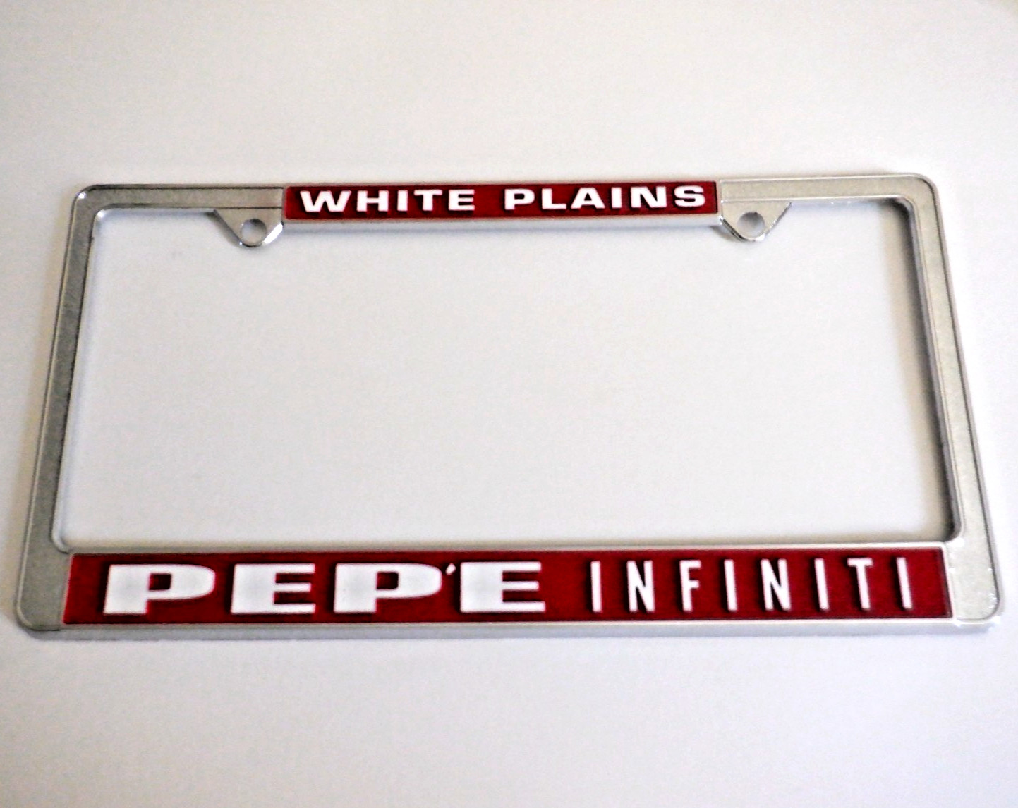 NOS 1990s Pepe INFINITI WHITE PLAINS NY Dealer LICENSE PLATE FRAME Nissan Datsun