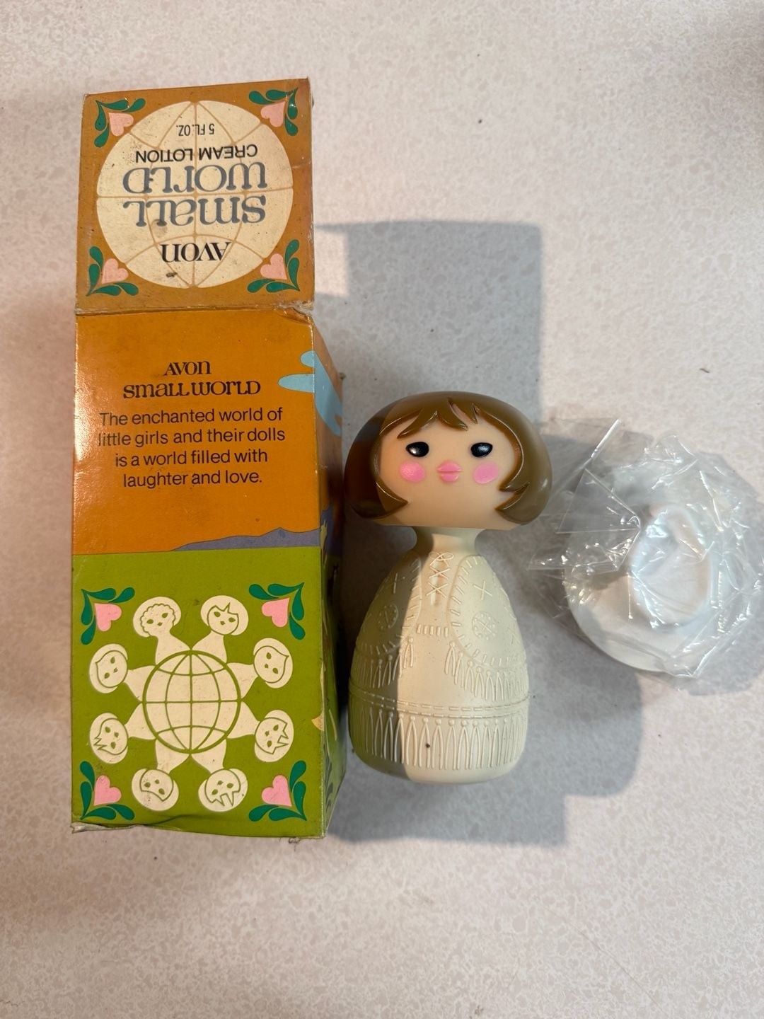 Avon Small World Cream Lotion 5 Fl Oz Vintage Doll Bottle-Never Used Avon Small World Cream Lotion 5 Fl Oz Vintage Doll Bottle-Never Used