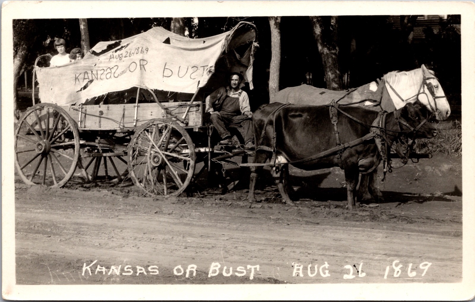 Kansas or Bust 1869 Covered Wagon Horse Team Pioneer RPPC Postcard