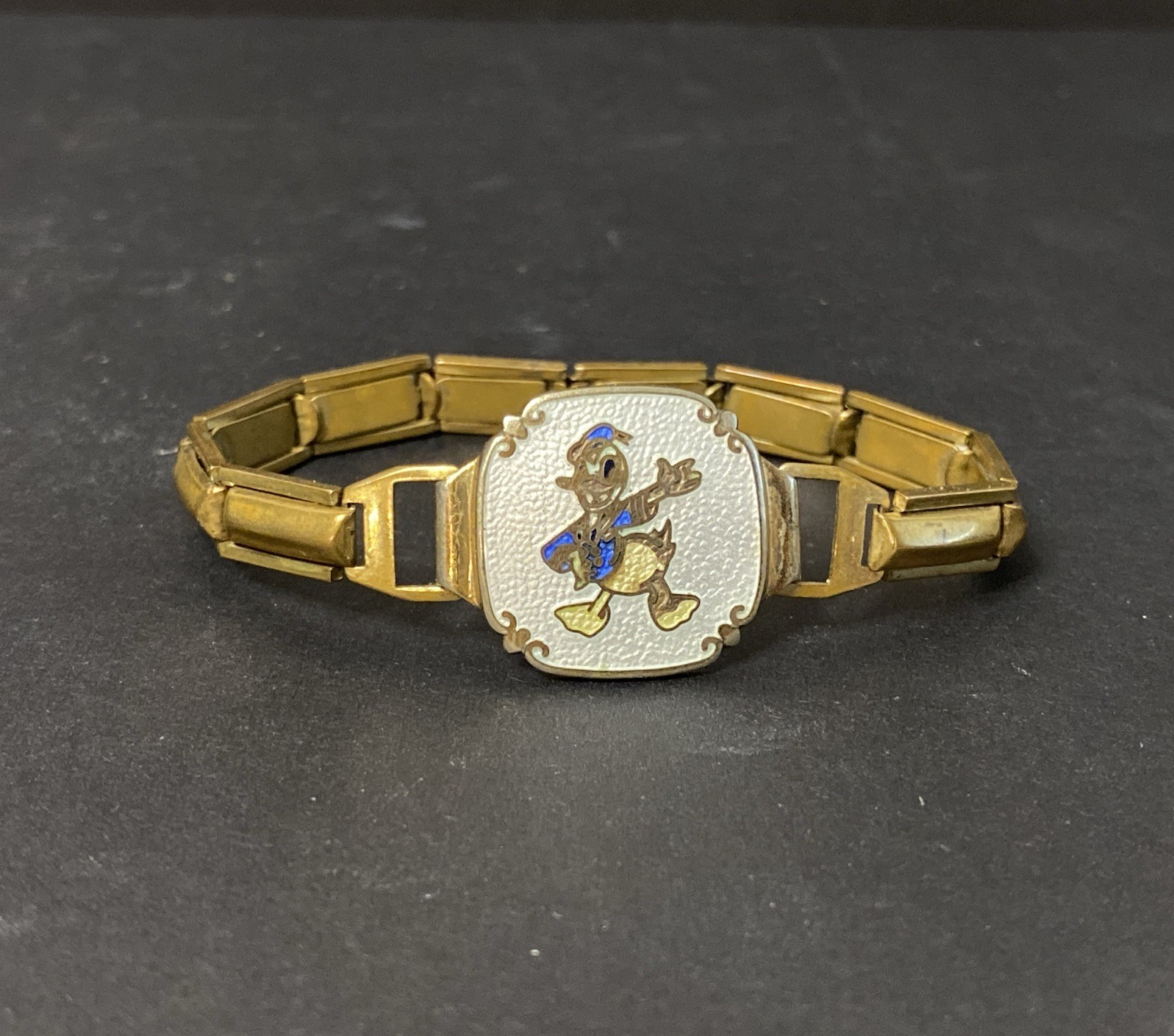 Vtg 70s 80s Disney Donald Duck Enamel Gold Tone Expansion Bracelet 5-1/4” Vtg 70s 80s Disney Donald Duck Enamel Gold Tone Expansion Bracelet 5-1/4”