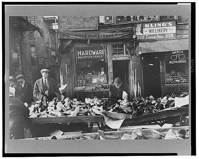 Photo:Chicago Illinois 1941 Maxwell Street shoe shop street market shoes