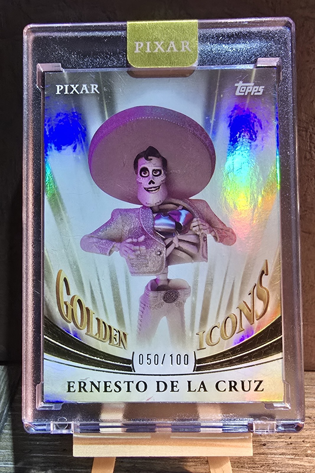 2025 Topps Pixar Gold Ernesto De La Cruz Golden Icons Encased #050/100