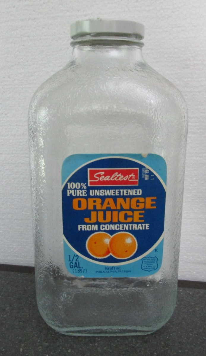VINTAGE SEALTEST ORANGE JUICE BOTTLE 1/2 GALLON EMPTY KRAFT INC. PAPER TABLE VINTAGE SEALTEST ORANGE JUICE BOTTLE 1/2 GALLON EMPTY KRAFT INC. PAPER TABLE