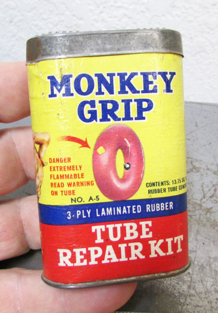 Monkey Grip Tire Tube Repair Kit, cardboard sides tin, fun garage decor, empty