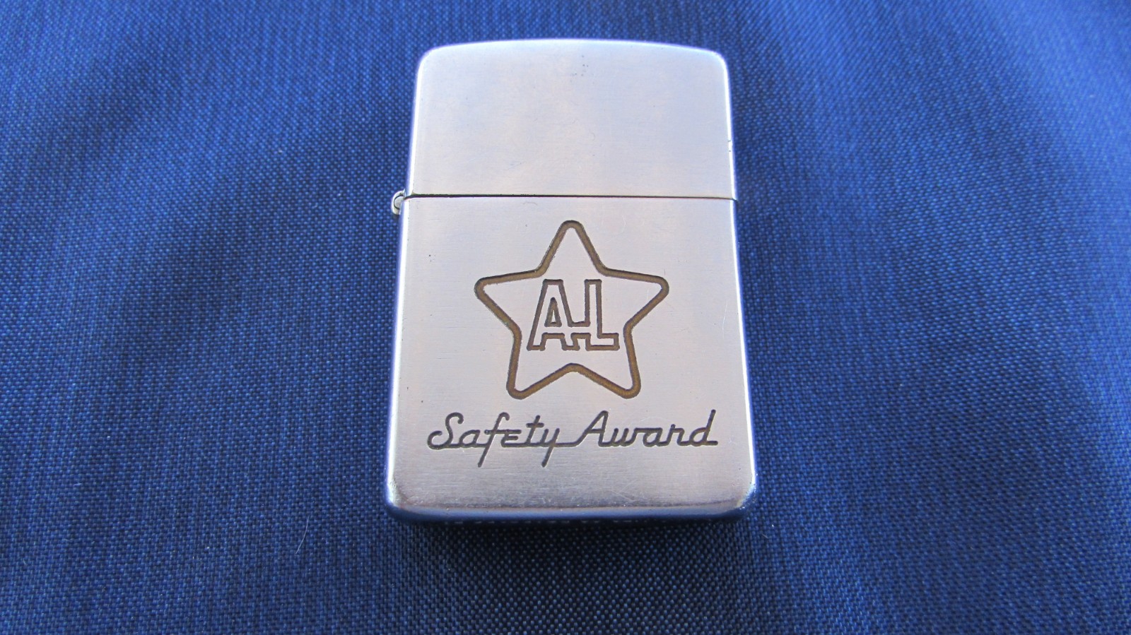USED VINTAGE 1954-57 ALLEGHENY LUDLUM STEEL SAFETY AWARD ZIPPO LIGHTER