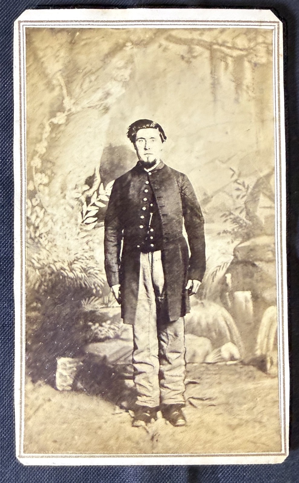 CDV of Civil War soldier in front of a great back drop. No back mark.